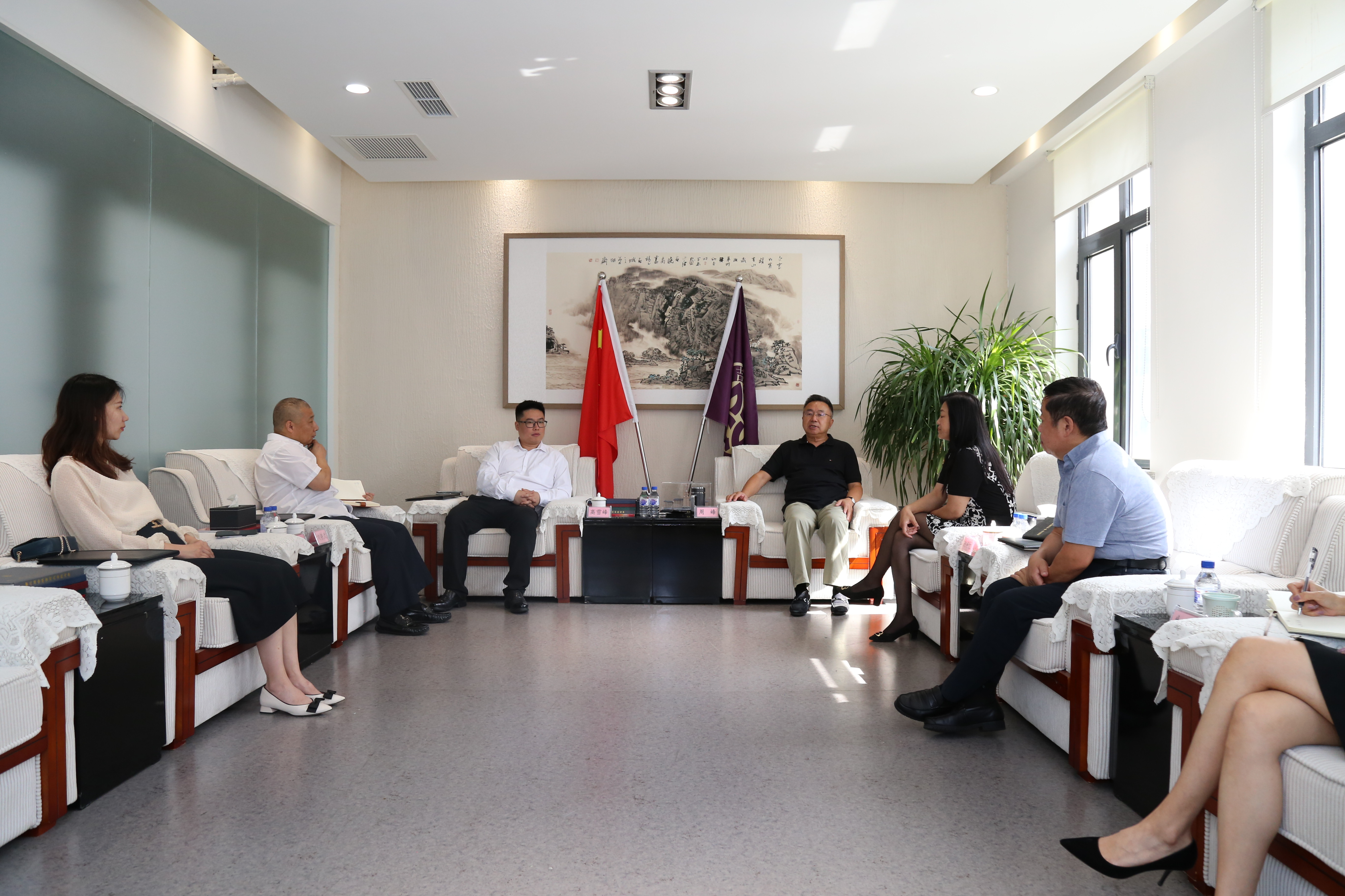 国吉控股集团与全球吉商联合会开展交流座谈